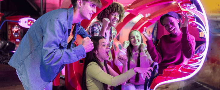 Young adults gather at an arcade